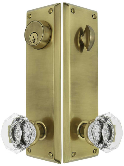Quincy Entry Set with Old-Town Crystal Glass Knobs in Antique Brass.